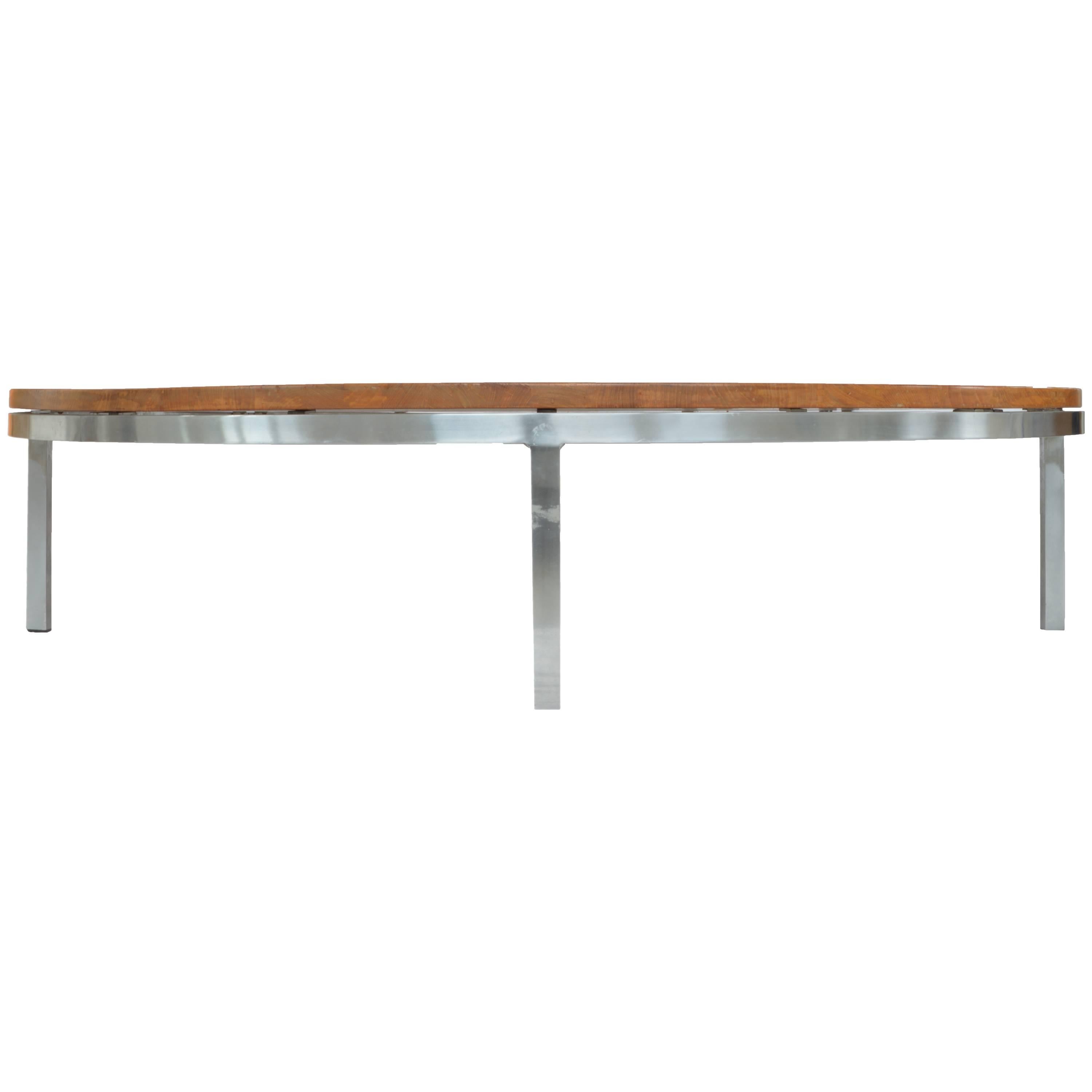 Large round coffee table by Arne Jacobsen for Fritz Hansen. Top is lacquered wood, on a polished aluminum base.

Offered by Neal Beckstedt