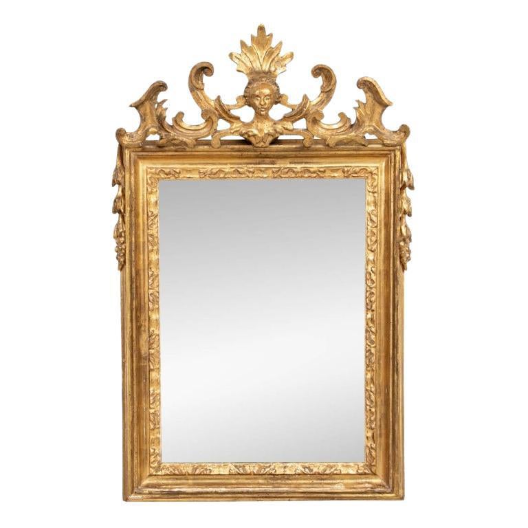 A.C.I.C. miroir sculpté et doré