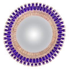 Blue Glass and Resin Convex Mirror.