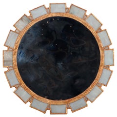 A Gray blue glass and resin mirror in the manner of Line Vautrin. Contemporary.