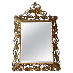 A Large Victorian Faux Bois Carved Giltwood Mirror