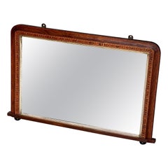 An attractive French Oak Art Nouveau Hall or Bistrot Mirror. The bevelled oval m