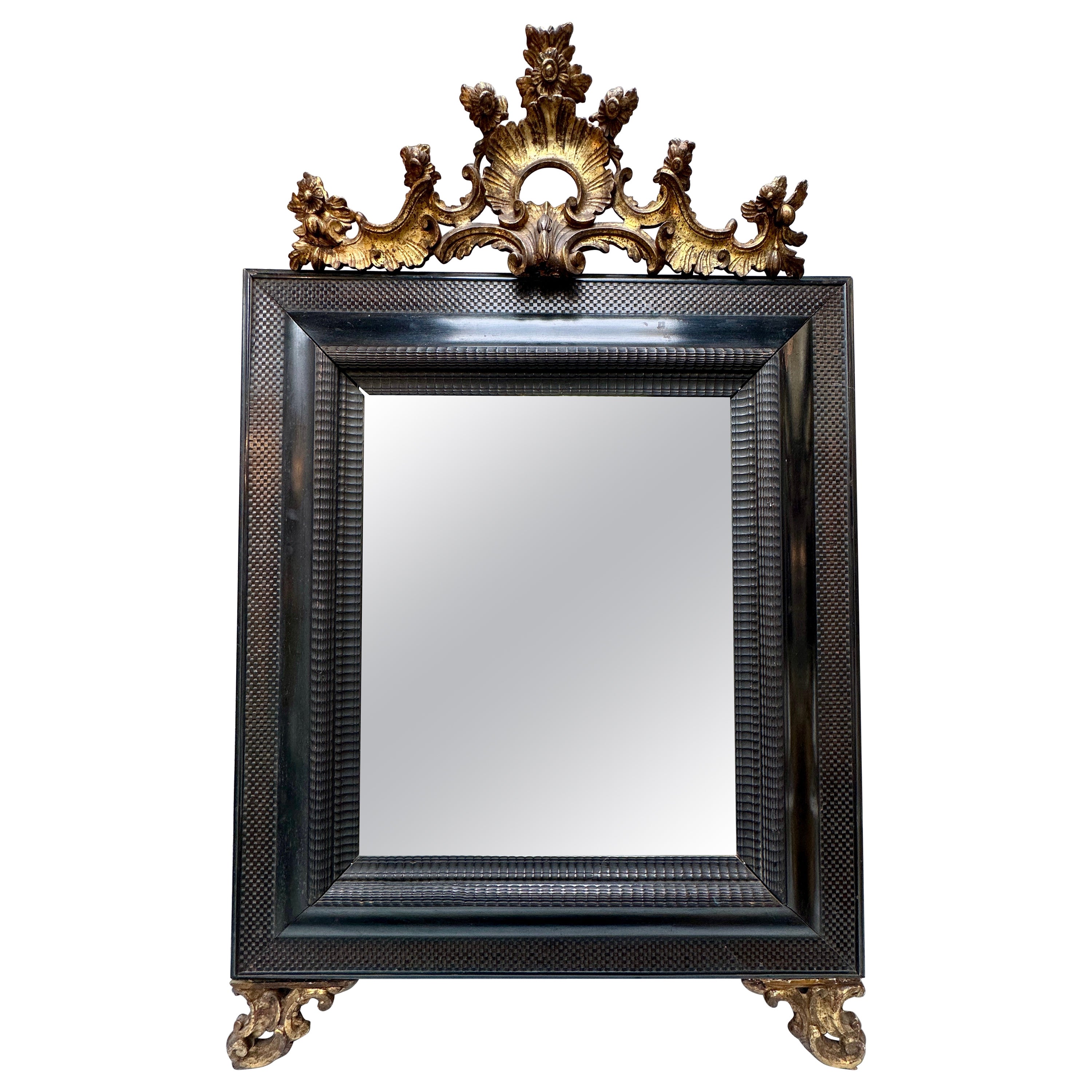 An Italian Late 19th Century Ebonized And Gold Gilt Mirror