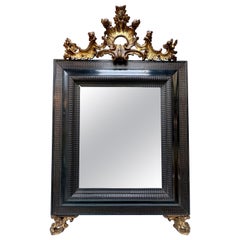 Antique An Italian Late 19th Century Ebonized And Gold Gilt Mirror
