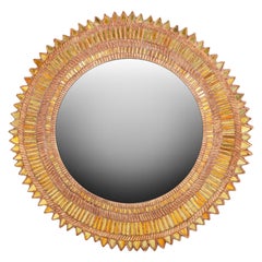 Yellow glass & resin convex mirror in the manner of Line Vautrin. Contemporary.