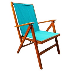 Folding chair produced by Reguitti. In the style of Carl Hauner