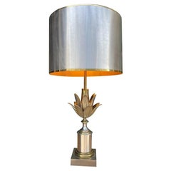 An orignal 1960s Maison Charles "Lotus" lamp with spun metal shade