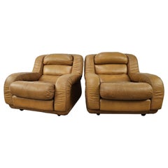 Coppia di poltrone vintage in pelle marrone anni '70
