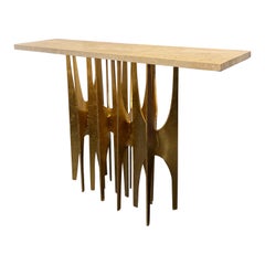 Giovanni Banci sculptural gilt iron, travertine console table .