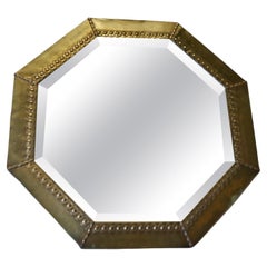 An Arts and Crafts Beaten Brass Mirror    This is a very stylish mirror