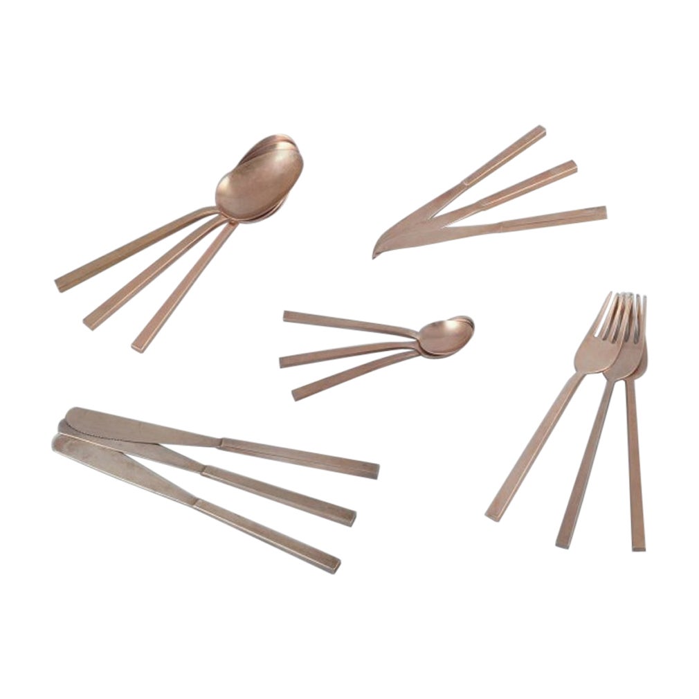 Couverts en laiton "Scanline" de Sigvard Bernadotte. Service de table pour trois personnes. 15 Pieces