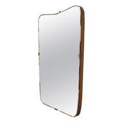 Italian mid-century modern Shaped wall mirror in wood and metal, 1950s