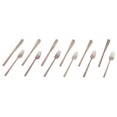 Vintage Sigvard Bernadotte "Scanline" brass flatware. Six dinner knives and forks