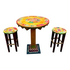Mesa y taburetes artísticos pintados a mano de estilo infantil Mckenzies, set de 3
