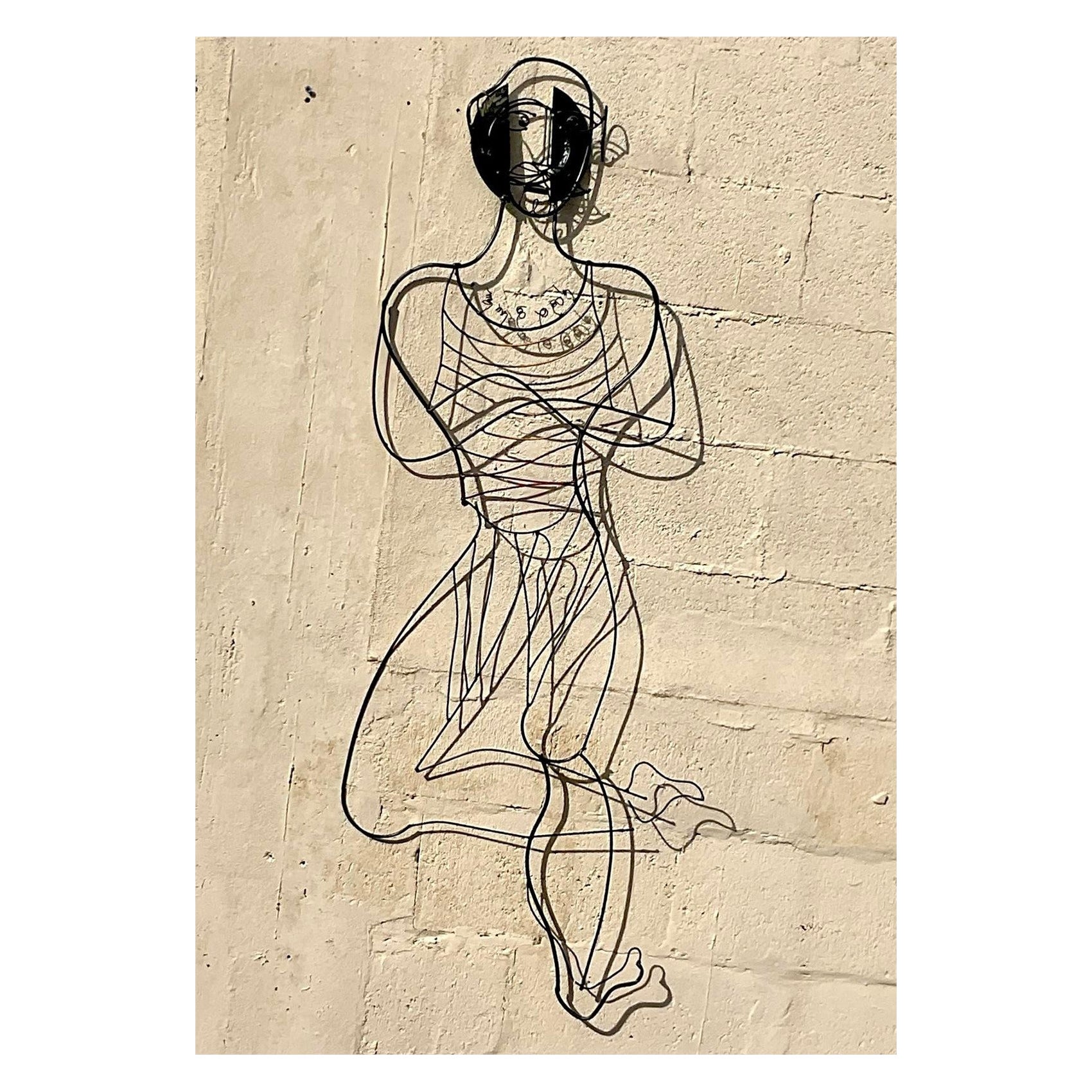 Escultura boho vintage de alambre de hombre