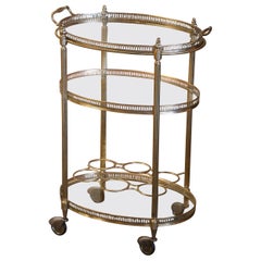 Mid-Century French Gilt Brass Oval Three-Tiered Trolley Bar Cart on Wheels