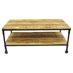 Table basse vintage de style industriel en fonte et bois récupéré vieilli