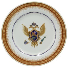Pareja de platos continentales de porcelana