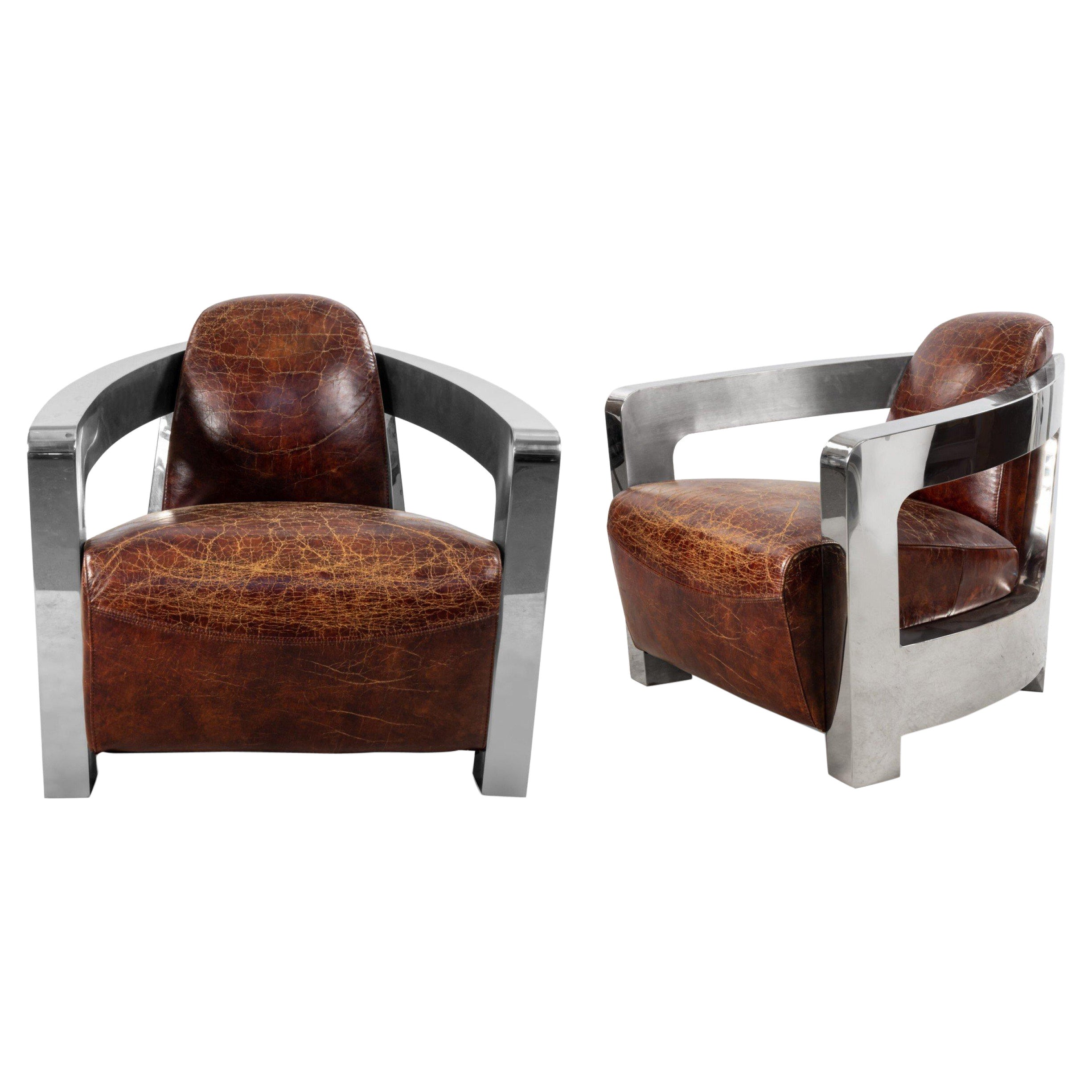Paire de chaises longues de style Art déco en cuir et chrome en vente