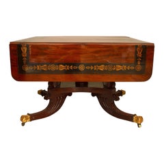 Mesa de comedor inglesa de caoba y dorada de la Regencia