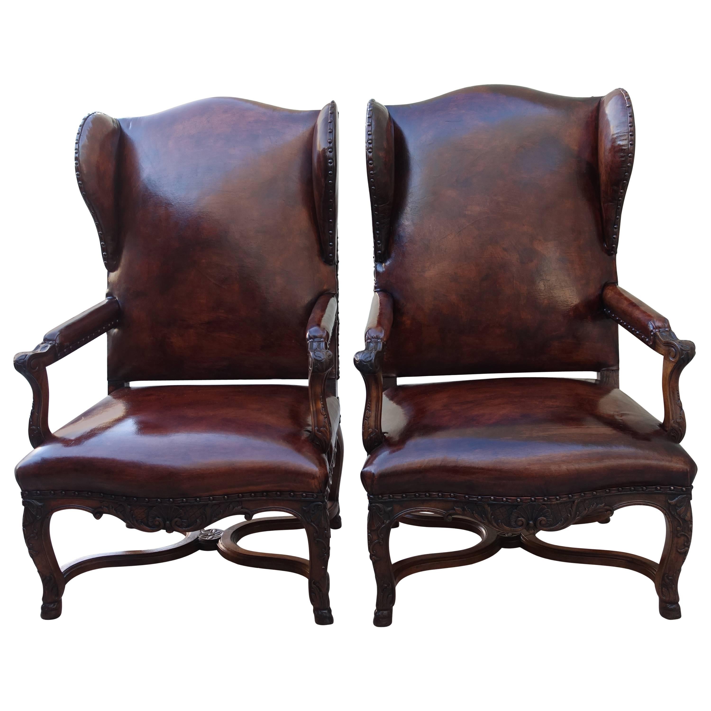 Pair of French Regence Style Leather Wingback Armchairs