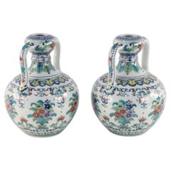 Pareja de jarrones chinos de porcelana Doucai de doble oreja