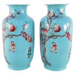 Pareja de jarrones chinos de porcelana teal de nueve melocotones