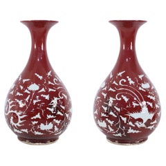 Pair of Chinese Burgundy and White Botanical Motif Porcelain Vases