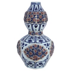 Chinese White and Blue and Raised Rose Design Double Gourd Porcelain Vase