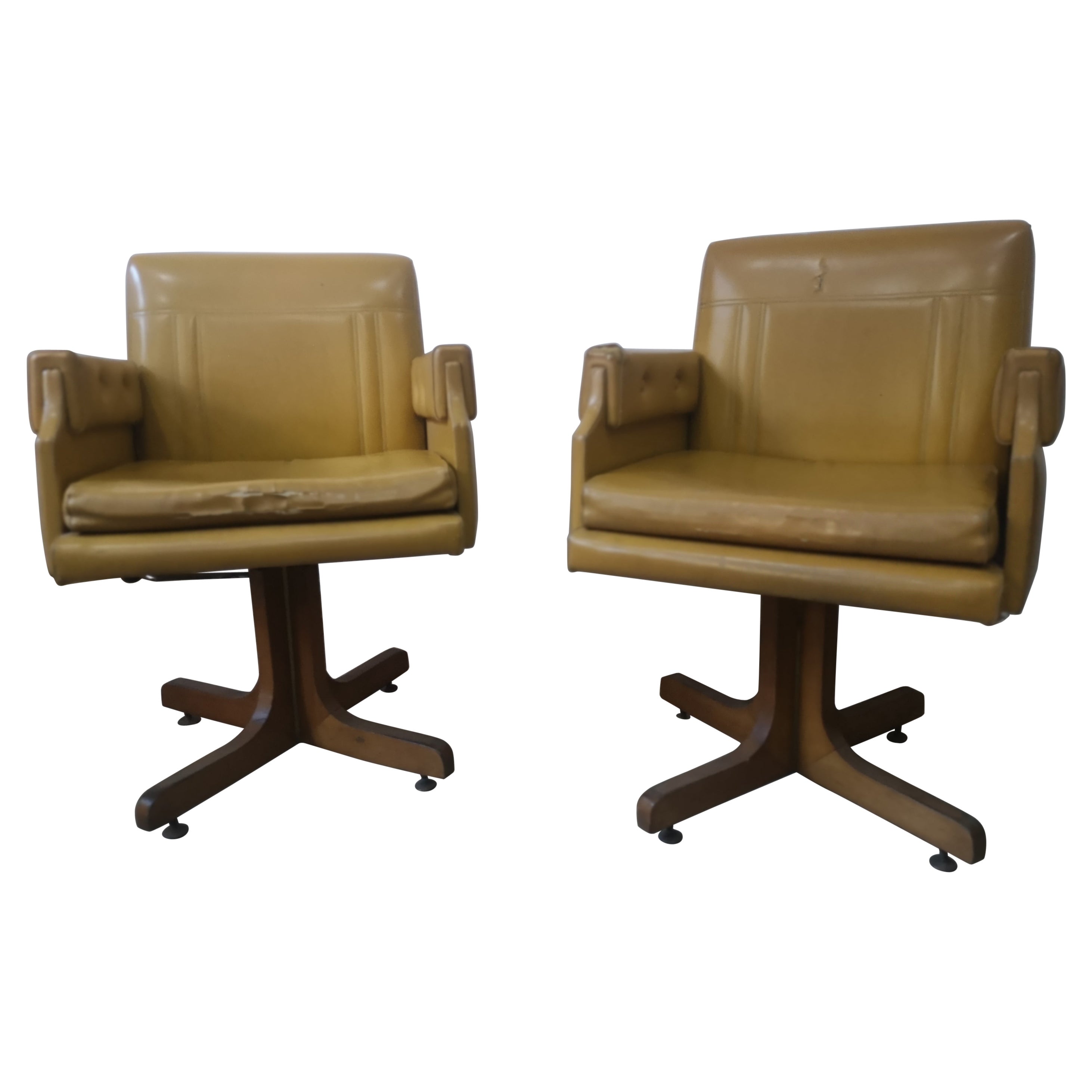 Pair of ocher yellow swivel armchairs from the 1970s