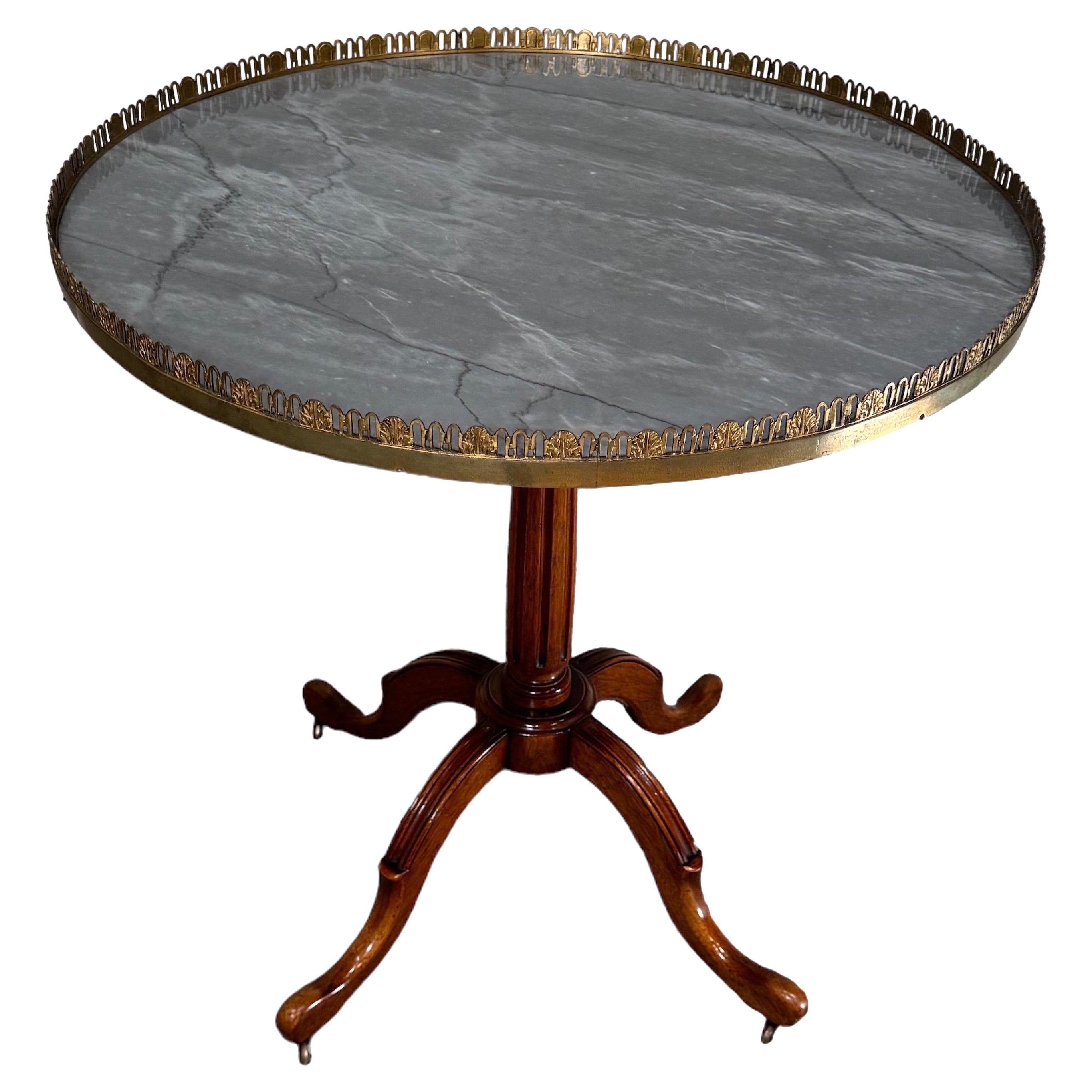 Mesa de caoba con tapa de mármol