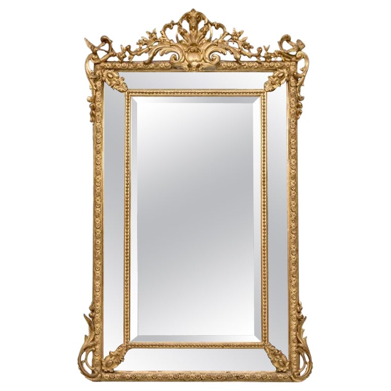 Grand Louis XVI Style Segmented Giltwood Mirror For Sale