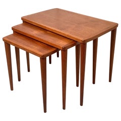 A Set of Three Mid Century Danish Teak Nesting Tables
