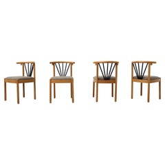 Set of Four Memphis Wooden Curved Back Dining Chairs with Warm Gray Seats