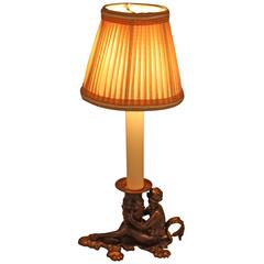 Young God with an Amphora Candlestick Lamp