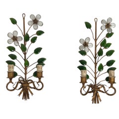 Pair of gilt metal and cut crystals wall sconces decorated with flowers