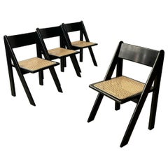 Rare set of four black lacquered wood and rattan, Italy 1960’s