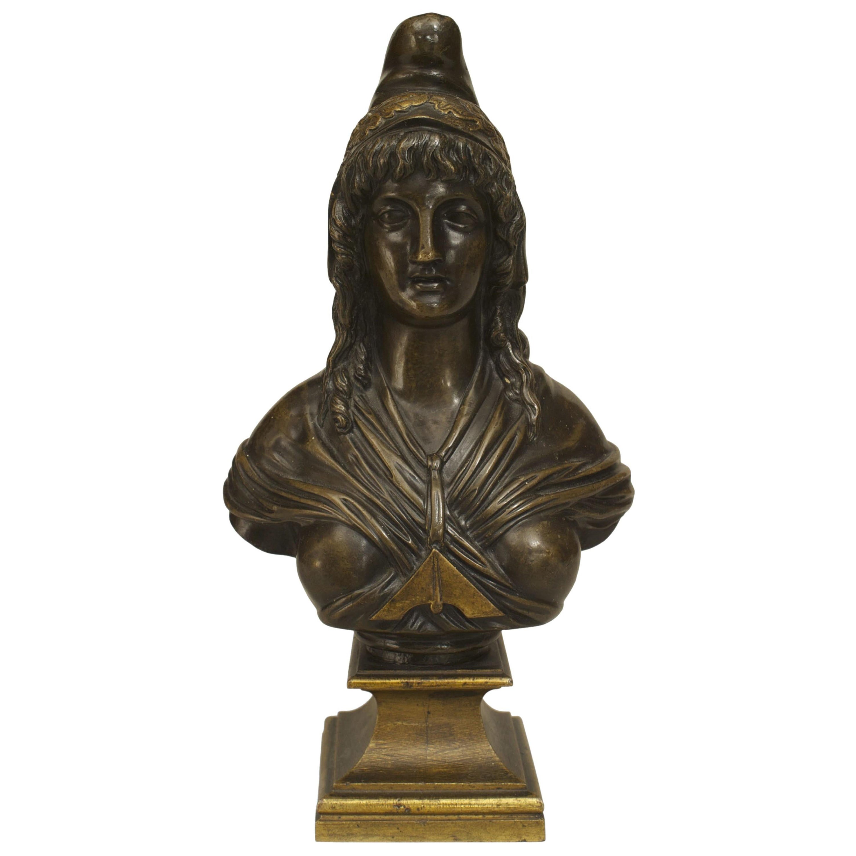 Busto de bronce de mujer griega