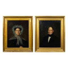 Paire de portraits d'hommes et de femmes américains