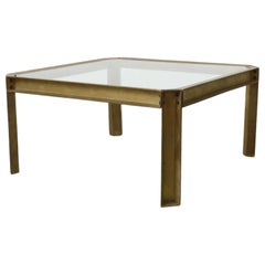 Tavolino in stile industriale in ottone e vetro Peter Ghyczy T09