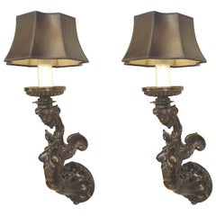 Pair of Caldwell Italian Renaissance Style Figural Brass Wall Sconces