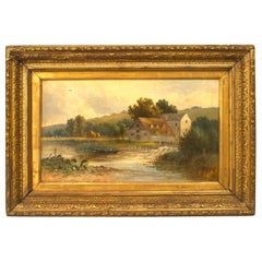 Paysage victorien français d'une maison par une rivière