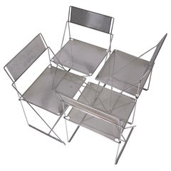 Set of 4 "Nuova" metal chairs by Niels Jørgen Haugesen