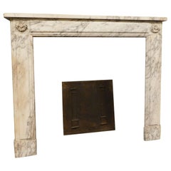 Fireplace mantle in white marble gray veins, sculpted pediment, Italy