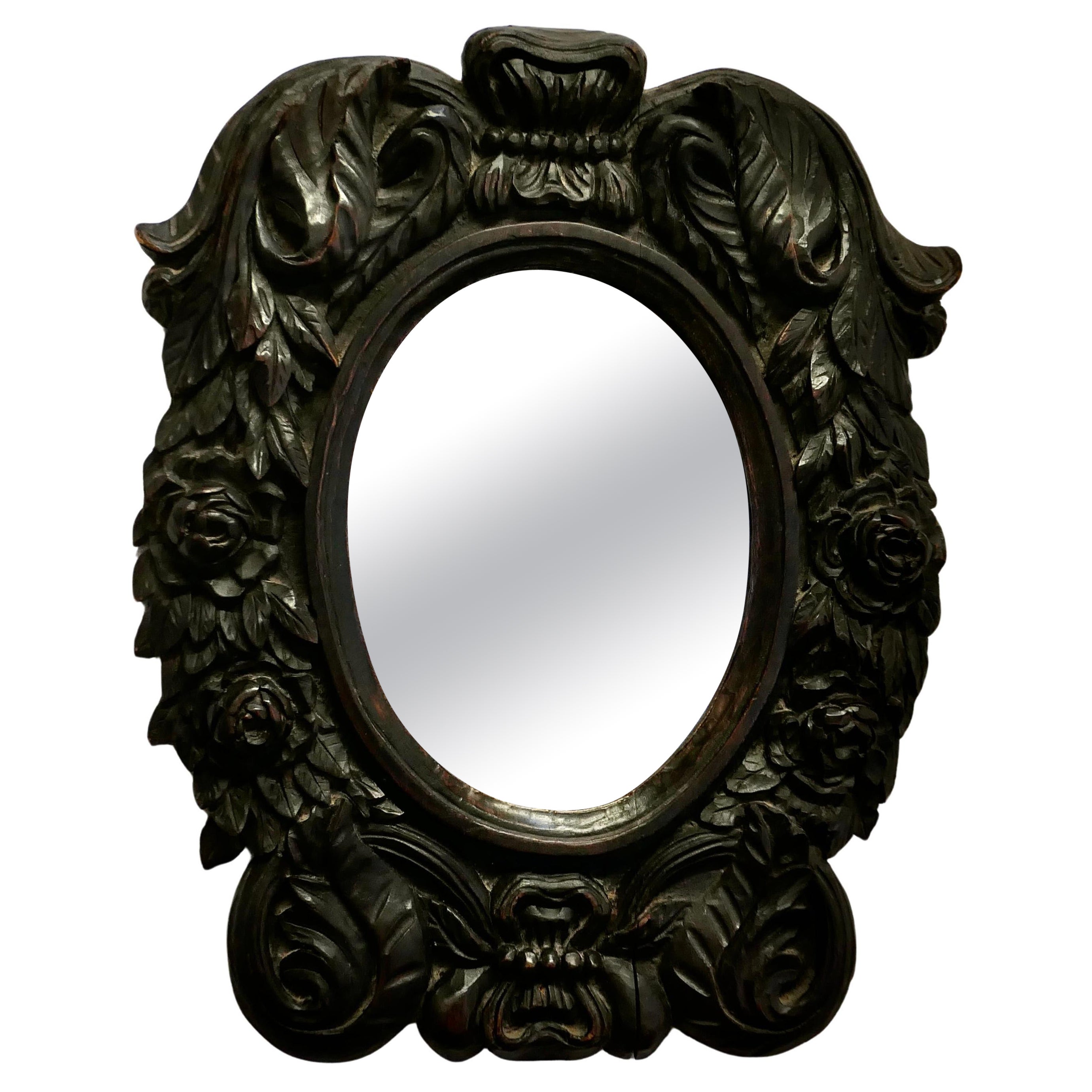 Gothic Carved Oak Oval Mirror  A lovely piece