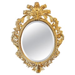 A Carved GIltwood Rococo Mirror By Harrison And Gil