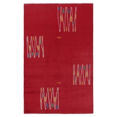 Alfombra turca vintage roja con motivos geométricos de colores, de Rug & Kilim