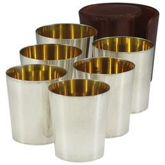 Set of Six Silver Beakers in Leather Case, hallmarked Birmingham 1950