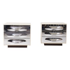 Pair of bedside tables by Raymond Loewy
