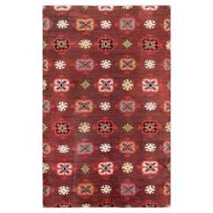Tappeto vintage Zeki Müren rosso con medaglioni geometrici, da Rug & Kilim